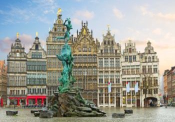 medieval Brabo fountain and old guildhalls houses at Grote Markt square, Antwerpen, Belgium