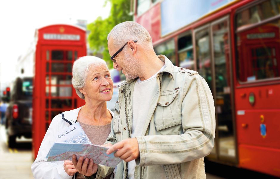 London Reisegruppe vor rotem Bus